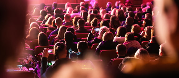 interior of a historic theatre filled with patrons